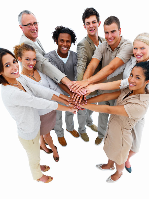 Group of employees standing with hands in